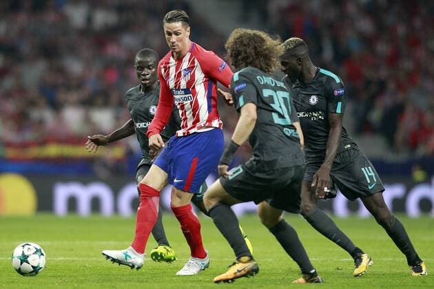 Atletico de Madrid s Fernando Torres (c) and Chelsea FC s N Golo Kante (l), Tiemoue Bakayoko (r) and David Luiz during Champions League 2017 2018, Group C, match 2. September 27,2017.  (2017092748)