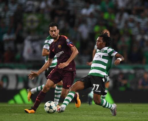 (170928) -- LISBON, Sept. 28, 2017 -- Barcelona s Sergio Busquets (L) vies with Sporting s Gelson Martins during the UEFA Champions League group D match between Sporting CP and FC Barcelona Barca in Lisbon, Portugal, on Sept. 27, 2017. Barcelona won 1-0. ) (SP)PORTUGAL-LISBON-FOOTBALL-CHAMPIONS LEAGUE-BARCELONA-SPORTING ZhangxLiyun 