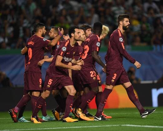 (170928) -- LISBON, Sept. 28, 2017 -- Barcelona s players celebrate their team s goal during the UEFA Champions League group D match between Sporting CP and FC Barcelona Barca in Lisbon, Portugal, on Sept. 27, 2017. Barcelona won 1-0. ) (SP)PORTUGAL-LISBON-FOOTBALL-CHAMPIONS LEAGUE-BARCELONA-SPORTING ZhangxLiyun 