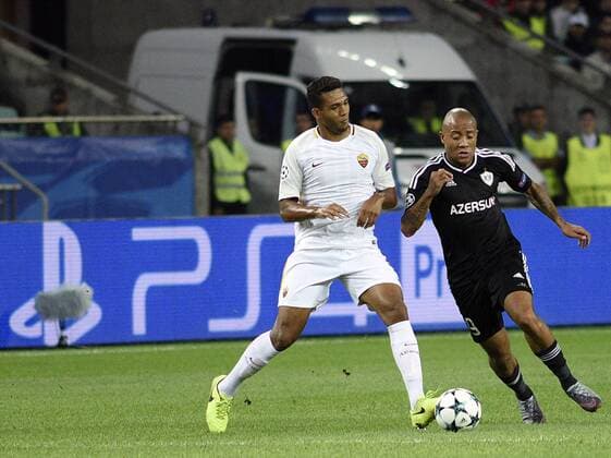 (170928) -- BAKU, Sept. 28, 2017 -- Qarabag s Dino Ndlovu (R) competes with Roma s Juan Jesus during the UEFA Champions League group C match between Qarabag and Roma in Baku, Azerbaijan, on Sept. 27, 2017. Roma won 2-1. ) (SP)AZERBAIJAN-BAKU-FOOTBALL-CHAMPIONS LEAGUE-ROMA-QARABAG TofikxBabayev 