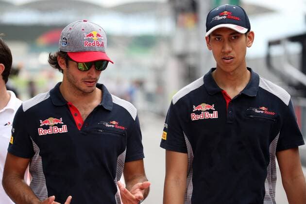 28.09.2017 - Carlos Sainz Jr (ESP) Scuderia Toro Rosso STR12 and Sean Gelael (INA) Test driver, Scuderia Toro Rosso STR12 Malaysian Grand Prix, Sepang 28 September - 1 October 2017 28.09.2017 - Carlos Sainz Jr (ESP) Scuderia Toro Rosso STR12 and Sean Gelael (INA) Test driver, Scuderia Toro Rosso STR12 