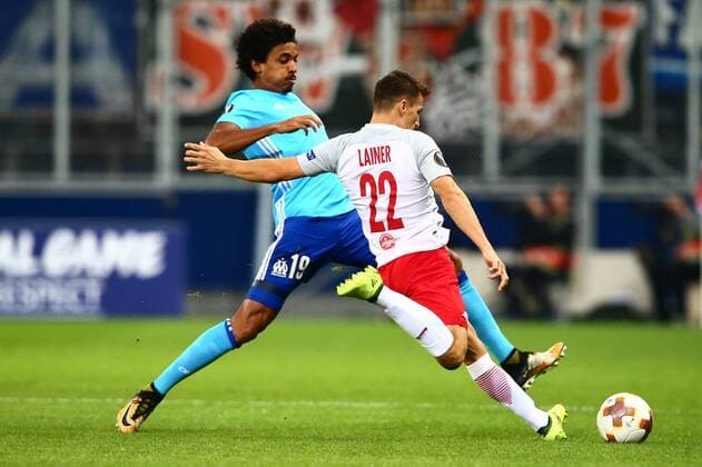 SOCCER - EL, RBS vs Marseille SALZBURG,AUSTRIA,28.SEP.17 - SOCCER - UEFA Europa League, group stage, Red Bull Salzburg vs Olympique Marseille. Image shows Luiz Gustavo (Marseille) and Stefan Lainer (RBS). GEPAxpictures xFelixxRoittner