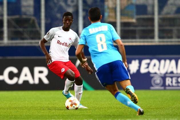 SOCCER - EL, RBS vs Marseille SALZBURG,AUSTRIA,28.SEP.17 - SOCCER - UEFA Europa League, group stage, Red Bull Salzburg vs Olympique Marseille. Image shows Amadou Haidara (RBS) and Morgan Sanson (Marseille). GEPAxpictures xFelixxRoittner