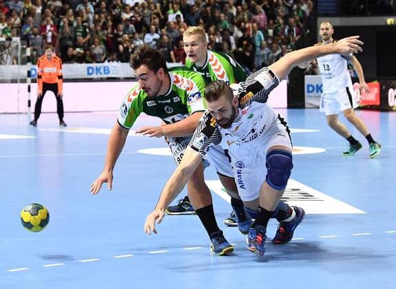 28.09.2017, xjhx, Handball HBL, HSG Wetzlar - DHfK Leipzig, emspor, v.l. Jannik Kohlbacher (HSG Wetzlar), Alen Milosevic (DHFK Leipzig) Wetzlar