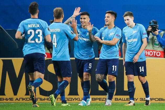 ST PETERSBURG, RUSSIA - SEPTEMBER 28, 2017: FC Zenit St Petersburg s Miha Mevlja, Domenico Criscito, Leandro Paredes, Sebastian Driussi, and Daler Kuzyayev (L-R) celebrate scoring in their 2017-18 UEFA Europa League Group L Round 2 football match against FC Real Sociedad at Saint Petersburg Stadium. Alexander Demianchuk TASS  TS0624DC