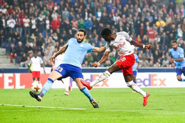 SOCCER - EL, RBS vs Marseille SALZBURG,AUSTRIA,28.SEP.17 - SOCCER - UEFA Europa League, group stage, Red Bull Salzburg vs Olympique Marseille. Image shows David Atanga (RBS) and Adil Rami (Marseille). GEPAxpictures xFelixxRoittner