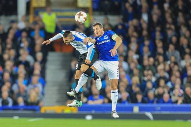 28th September 2017, Goodison Park, Liverpool, England; UEFA Europa League group stage, Everton versus Apollon Limassol; Leighton Baines of Everton FC wins the header from Anton Maglica of Apollon Limassol  ActionPlus11934966
