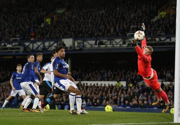 Hector Yuste of Apollon Limassol FC scores the equalising goal past a diving Jordan Pickford of Everton during the Europa League Group E match at Goodison Park Stadium, Liverpool. Picture date: September 28th 2017. Picture credit should read: Simon Bellis Sportimage EDITORIAL USE ONLY. No use with unauthorised audio, video, data, fixture lists, club league logos or live services. Online in-match use limited to 120 images, no video emulation. No use in betting, games or single club league player publications.