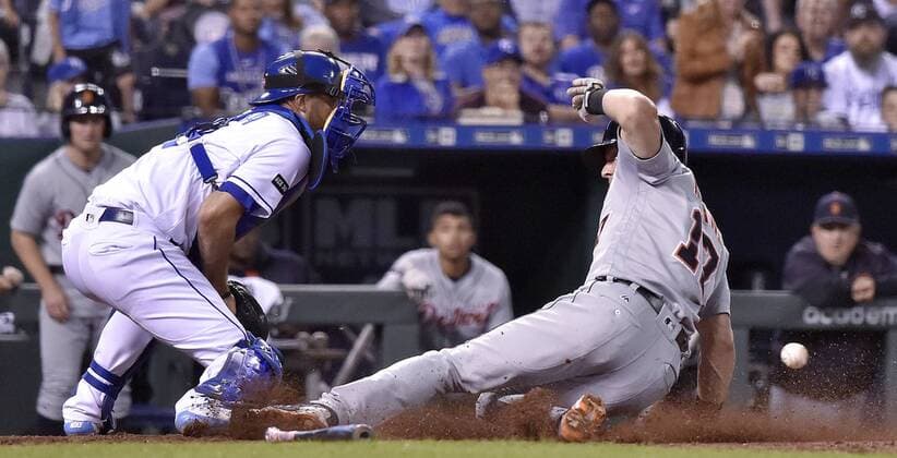 September 28, 2017 - Kansas City, MO, USA - The Detroit Tigers Andrew Romine, right, scores ahead of the throw toKansas City Royals catcher Drew Butera on a single by JaCoby Jones in the fifth inning at Kauffman Stadium in Kansas City, Mo., on Thursday, Sept. 28, 2017. Detroit at Kansas City - ZUMAm67_ 20170928_zaf_m67_039 Copyright: xJohnxSleezerx