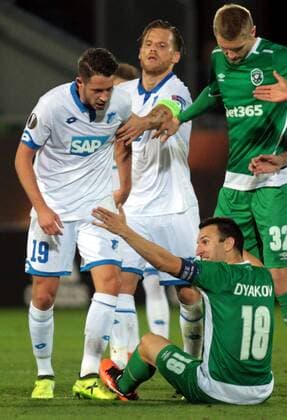 28.09.2017 Razgrad(Bulgaria) PFC Ludogorets-TSG 1899 Hoffenheim Europa League men s football Eugen Polanski(2L) try to stop Mark UTH(L)TSG 1899 Hoffenheim angry at Svetoslav Dyakov(r) PFC Ludogorets why sitting on grass : 