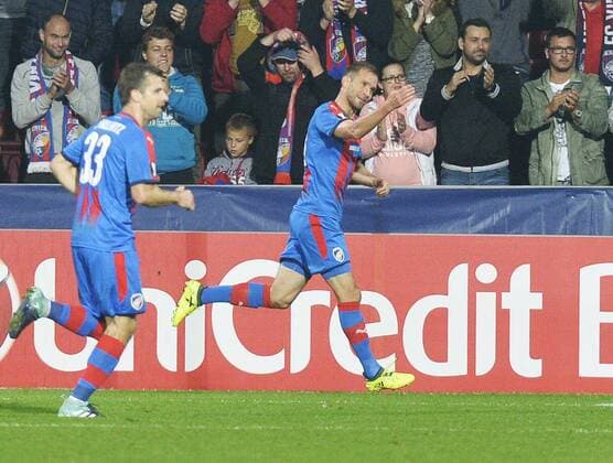 R-L players of Plzen MAREK BAKOS celebrates his goal and ANDREAS IVANSCHITZ runs during the 2nd round group G European League soccer match Viktoria Plzen vs Hapoel Beer Sheva in Pilsen, Czech Republic, on September 28, 2017. (CTKxPhoto MiroslavxChaloupka) CTKPhotoP201709280992701  cha21k