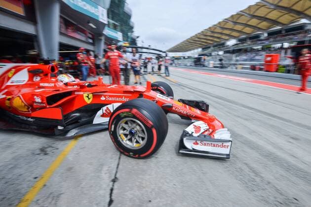 (170929) -- SEPANG, Sept. 29, 2017 -- Germany s Formula One driver Sebastian Vettel of Ferrari drives out of the pit during the second practice session of the Formula One Malaysia Grand Prix at the Sepang Circuit in Malaysia, on Sept. 29, 2017. ) (SP)MALAYSIA-SEPANG-F1-2ND PRACTICE SESSION ChongxVoonxChung 
