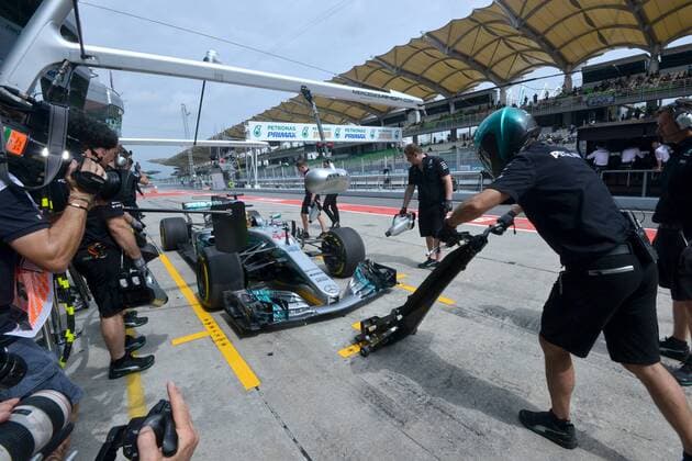 (170929) -- SEPANG, Sept. 29, 2017 -- Mercedes British driver Lewis Hamilton drives into the pit during the second practice session of the Formula One Malaysia Grand Prix at the Sepang Circuit in Malaysia, on Sept. 29, 2017. ) (SP)MALAYSIA-SEPANG-F1-2ND PRACTICE SESSION ChongxVoonxChung 