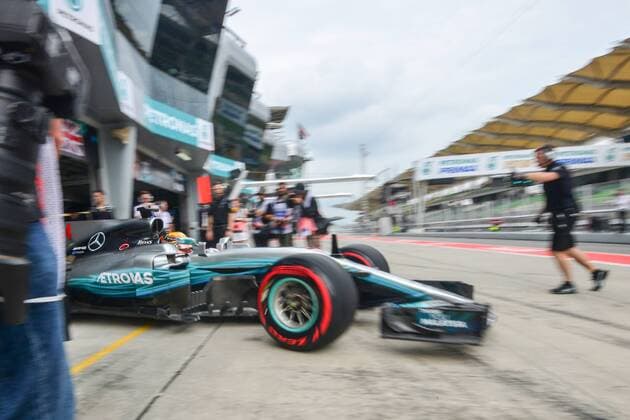 (170929) -- SEPANG, Sept. 29, 2017 -- Mercedes British driver Lewis Hamilton drives out of the pit during the second practice session of the Formula One Malaysia Grand Prix at the Sepang Circuit in Malaysia, on Sept. 29, 2017. ) (SP)MALAYSIA-SEPANG-F1-2ND PRACTICE SESSION ChongxVoonxChung 