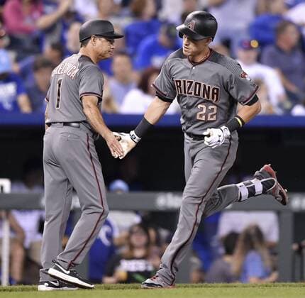 September 29, 2017 - Kansas City, MO, USA - The Arizona Diamondbacks Jake Lamb is congratulated by third base coach Tony Perezchica, left, after hitting a solo home run in the second inning against the Kansas City Royals at Kauffman Stadium in Kansas City, Mo., on Friday, Sept. 29, 2017. Arizona at Kansas City - ZUMAm67_ 20170929_zaf_m67_029 Copyright: xJohnxSleezerx
