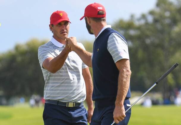 Saturday September 30, 2017: Dustin Johnson and Brooks Koepka of the United States fist bump on the 3rd hole during the fourth round of the Presidents Cup at Liberty National Golf Course in Jersey City, New Jersey. CSM PGA Golf Herren 2017: Presidents Cup SEPT 30 - ZUMAc04_ 20170930_zaf_c04_226 Copyright: xGregoryxVasilx