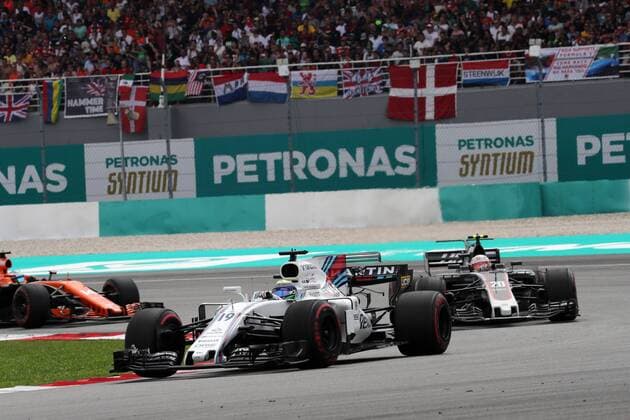 01.10.2017 - Race, Felipe Massa (BRA) Williams FW40 leads Kevin Magnussen (DEN) Haas F1 Team VF-17 Malaysian Grand Prix, Sepang 28 September - 1 October 2017 01.10.2017 - Race, Felipe Massa (BRA) Williams FW40 leads Kevin Magnussen (DEN) Haas F1 Team VF-17 