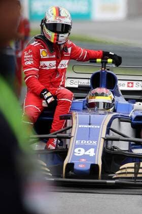 01.10.2017 - Race, Sebastian Vettel (GER) Scuderia Ferrari SF70H gets a lift to the parc ferme. Malaysian Grand Prix, Sepang 28 September - 1 October 2017 01.10.2017 - Race, Sebastian Vettel (GER) Scuderia Ferrari SF70H gets a lift to the parc ferme. 