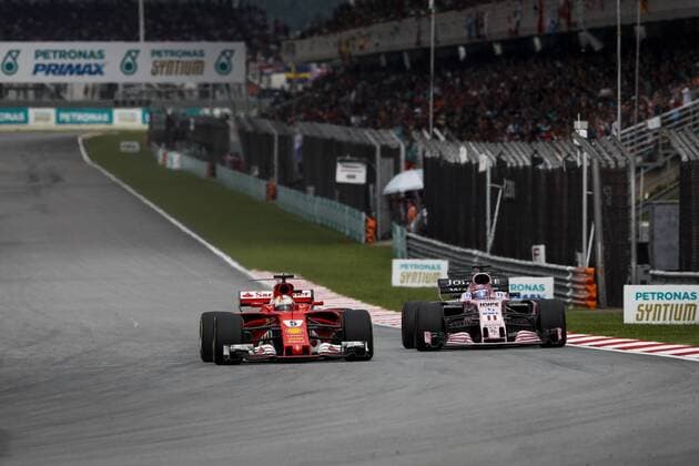 Motorsports: FIA Formula One World Championship WM Weltmeisterschaft 2017, Grand Prix of Malaysia, 5 Sebastian Vettel (GER, Scuderia Ferrari), 11 Sergio Perez (MEX, Sahara Force India F1 Team), Sepang Malaysia