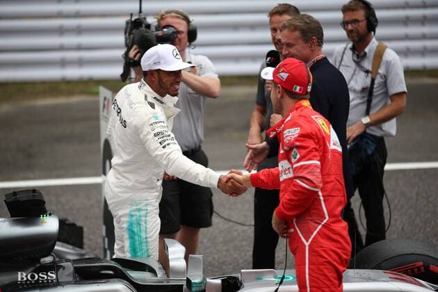 07.10.2017- After Qualifying celebration: Lewis Hamilton (GBR) Mercedes AMG F1 W08 shake in hands with Sebastian Vettel (GER) Scuderia Ferrari SF70H Japanese Grand Prix, Suzuka 05 - 08 October 2017 07.10.2017- After Qualifying celebration: Lewis Hamilton (GBR) Mercedes AMG F1 W08 shake in hands with Sebastian Vettel (GER) Scuderia Ferrari SF70H 