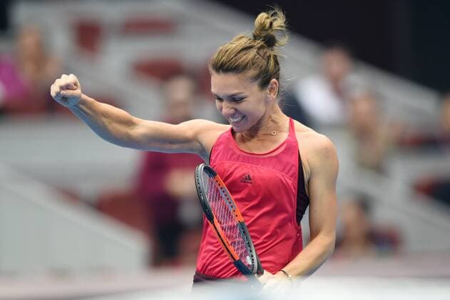(171007) -- BEIJING, Oct. 7, 2017 -- Simona Halep of Romania celebrates after winning the women s singles semifinal match against Jelena Ostapenko of Latvia at the China Open tennis tournament in Beijing on Oct. 7, 2017. Simona Halep won 2-0 and advanced to the final. )(wll) (SP)CHINA-BEIJING-TENNIS-CHINA OPEN(CN) JuxHuanzong 