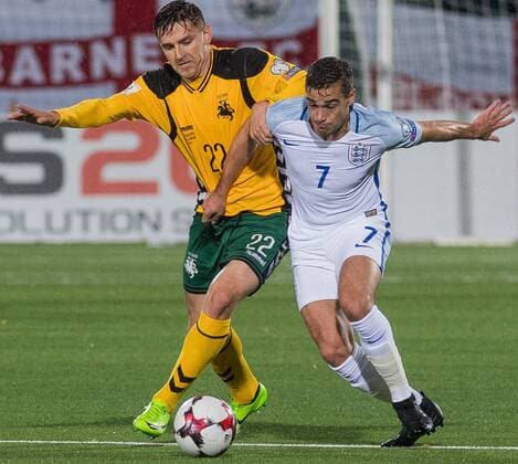 (171009) -- VILNIUS, Oct. 9, 2017 -- Fiodor Cernych (L) of Lithuania vies with Harry Winks of England during the FIFA World Cup WM Weltmeisterschaft Fussball European Qualifying Group F match between Lithuania and England in Vilnius, Lithuania, on Oct. 8, 2017. England won 1-0. ) (SP)LITHUANIA-VILNIUS-WORLD CUP QUALIFIER-LITHUANIA VS ENGLAND AlfredasxPliadis 