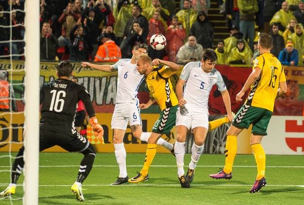 (171009) -- VILNIUS, Oct. 9, 2017 -- John Stones (2nd, L) of England vies with Vytautas Andriuskevicius (3rd, L) of Lithuania during the FIFA World Cup WM Weltmeisterschaft Fussball European Qualifying Group F match between Lithuania and England in Vilnius, Lithuania, on Oct. 8, 2017. England won 1-0. ) (SP)LITHUANIA-VILNIUS-WORLD CUP QUALIFIER-LITHUANIA VS ENGLAND AlfredasxPliadis 