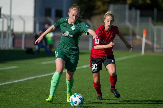 v left Verena Volkmer SV Werder Bremen 16 in duel Duel with Carolin Simon SC Freiburg 30 Football Alliance Women Bundesliga SC Freiburg SV Werder Bremen xobx