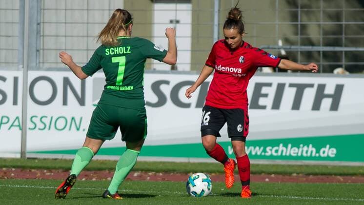 v left Lisa Marie Scholz SV Werder Bremen 7 in duel Duel with Lina Magull SC Freiburg 16 Football Alliance Women Bundesliga SC Freiburg SV Werder Bremen xobx