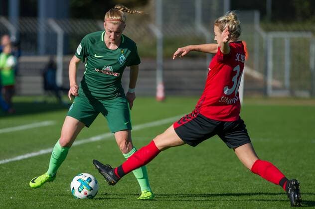 v left Verena Volkmer SV Werder Bremen 16 in duel Duel with Carolin Simon SC Freiburg 30 Football Alliance Women Bundesliga SC Freiburg SV Werder Bremen xobx
