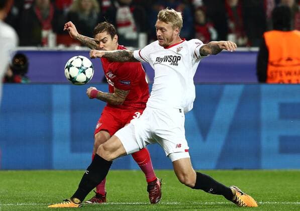 MOSCOW, RUSSIA - OCTOBER 17, 2017: Spartak Moscow s Andrei Yeshchenko (L) and FC Sevilla s Simon Kjaer fight for the ball in their 2017 18 UEFA Champions League Group E Round 3 football match at Otkrytiye Arena Stadium. Stanislav Krasilnikov TASS  TS0650AD