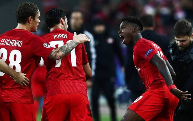 MOSCOW, RUSSIA - OCTOBER 17, 2017: Spartak Moscow s Andrei Yeshchenko, Ivelin Popov and Quincy Promes (L-R) celebrate scoring in the 2017 18 UEFA Champions League Group E Round 3 football match against FC Sevilla at Otkrytiye Arena Stadium. Stanislav Krasilnikov TASS  TS0650B4