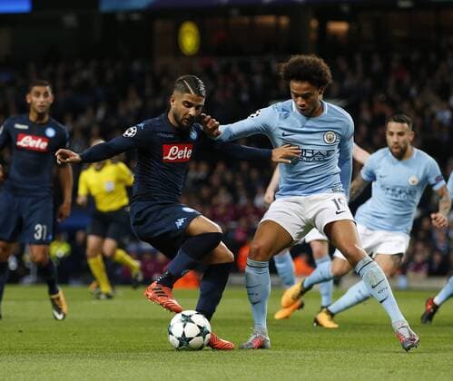 Lorenzo Insigne of Napoli held up by Leroy Sane of Manchester City during the champions league match at the Etihad Stadium, Manchester. Picture date 17th October 2017. Picture credit should read: Simon Bellis Sportimage EDITORIAL USE ONLY. No use with unauthorised audio, video, data, fixture lists, club league logos or live services. Online in-match use limited to 120 images, no video emulation. No use in betting, games or single club league player publications.