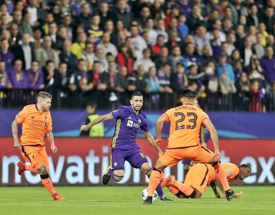 SOCCER - CL, Maribor vs Liverpool MARIBOR,SLOVENIA,17.OCT.17 - SOCCER - UEFA Champions League, group stage, NK Maribor vs Liverpool FC. Image shows Marwan Kabha (Maribor) and Emre Can (Liverpool). GEPAxpictures xM.xOberlaender