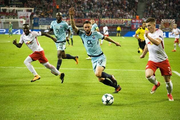 UEFA Champions League 2017 2018 Group stage 3 Matchday RB Leipzig vs FC Porto Sabitzer RBL right before Miguel Layun Porto left waiting Naby Keita RBL on a Passport Leipzig Saxony Germany
