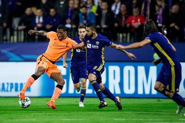 MARIBOR, SLOVENIA - OCTOBER 17: Gerginio Winjaldum of Liverpool FC vs Marwan Kabha of NK Maribor during UEFA Champions League 2017 18 group E match between NK Maribor and Liverpool FC at Stadium Ljudski vrt, on October 17, 2017 in Maribor, Slovenia. (Photo by Vid Ponikvar Sportida) Football  Copyright: xVidxPonikvarx xSportidax