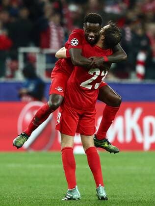 MOSCOW, RUSSIA - OCTOBER 17, 2017: Spartak Moscow s Quincy Promes (L) and Dmitry Kombarov celebrate their club s victory in the 2017 18 UEFA Champions League Group E Round 3 football match against FC Sevilla at Otkrytiye Arena Stadium. FC Spartak Moscow won the game 5-1. Stanislav Krasilnikov TASS  TS0650E1