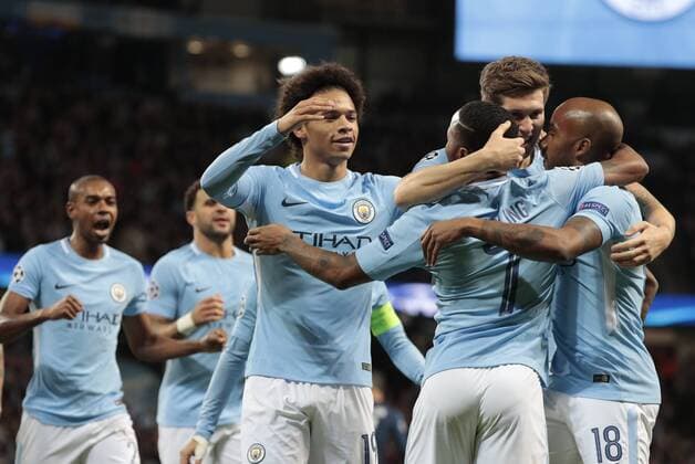 17th October 2017, Etihad Stadium, Manchester, England; UEFA Champions League, Manchester City versus Napoli; Manchester City players rush to congratulate Raheem Sterling on scoring the opening goal of the game in the 8th minute  ActionPlus11941176