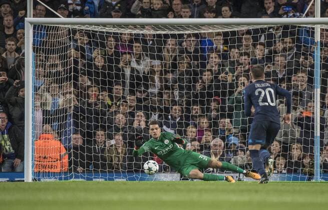 17th October 2017, Etihad Stadium, Manchester, England; UEFA Champions League, Manchester City versus Napoli; Ederson of Manchester City saves a penalty kick from Dries Mertens of Napoli  ActionPlus11941178