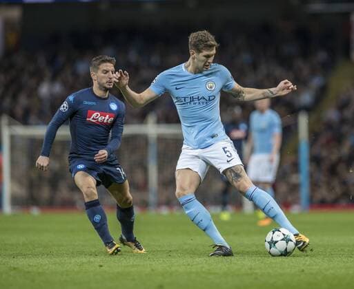 17th October 2017, Etihad Stadium, Manchester, England; UEFA Champions League, Manchester City versus Napoli; John Stones of Manchester City shields the ball from Dries Mertens of Napoli  ActionPlus11941188