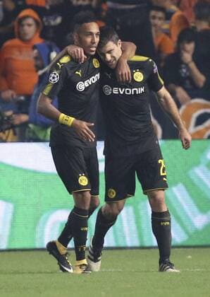 (171018) -- NICOSIA, Oct. 18, 2017 -- Bortussia Dortmund s Sokratis Papastathopoulos (R) celebrates scoring during the 2017-2018 Champions League match against Apoel in Nicosia, Cyprus, Oct. 17, 2017. The match tied 1-1. ) (SP)CYPRUS-NICOSIA-SOCCER-UEFA CHAMPIONS LEAGUE-BORTMUND VS APOEL SakisxSavvides 