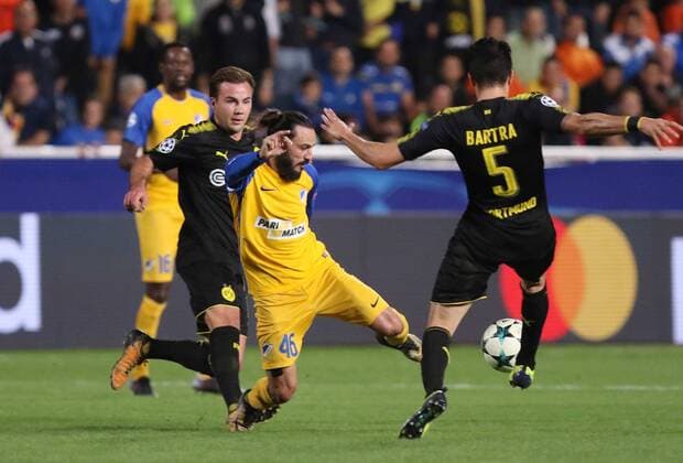 (171018) -- NICOSIA, Oct. 18, 2017 -- Apoel s Stathis Aloneftis (C) vies for the ball during the 2017-2018 Champions League match against Bortussia Dortmund in Nicosia, Cyprus, Oct. 17, 2017. The match tied 1-1. ) (SP)CYPRUS-NICOSIA-SOCCER-UEFA CHAMPIONS LEAGUE-BORTMUND VS APOEL SakisxSavvides 