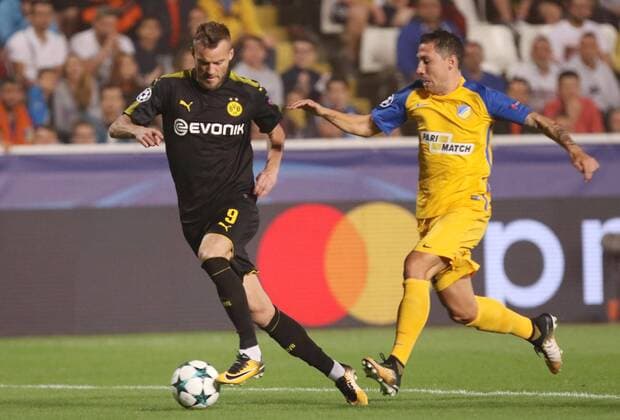 (171018) -- NICOSIA, Oct. 18, 2017 -- Bortussia Dortmund s Andriy Yarmolenko (L) vies for the ball during the 2017-2018 Champions League match against Apoel in Nicosia, Cyprus, Oct. 17, 2017. The match tied 1-1. ) (SP)CYPRUS-NICOSIA-SOCCER-UEFA CHAMPIONS LEAGUE-BORTMUND VS APOEL SakisxSavvides 