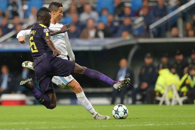 (171018) -- MADRID, Oct. 18, 2017 -- Cristiano Ronaldo (R) of Real Madrid vies with Davinson Sanchez of Tottenham during the match of Group H of 2017-18 Champions League in Madrid, Spain on Oct. 17, 2017. The match tied 1-1. ) (SP)SPAIN-MADRID-SOCCER-CHAMPIONS LEAGUE-REAL MADRID VS TOTTENHAM JuanxCarlosxRojas 