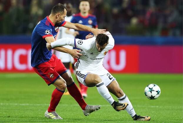 MOSCOW, RUSSIA - OCTOBER 18, 2017: CSKA Moscow s Sergei Ignashevich and Basel s Albian Ajeti (L-R front) in their 2017 18 UEFA Champions League Group A Round 3 football match at VEB Arena. Artyom Korotayev TASS  TS0654FF