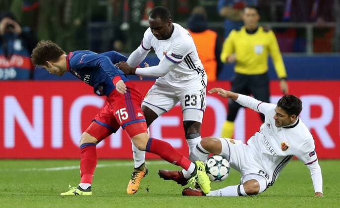 MOSCOW, RUSSIA - OCTOBER 18, 2017: CSKA Moscow s Timur Zhamaletdinov, Basel s Eder Alvarez Balanta, and Raoul Petretta (L-R) in their 2017 18 UEFA Champions League Group A Round 3 football match at VEB Arena. Artyom Korotayev TASS  TS065504