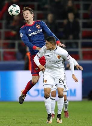 MOSCOW, RUSSIA - OCTOBER 18, 2017: CSKA Moscow s Mario Fernandes (L) and Basel s Mohamed Elyounoussi in their 2017 18 UEFA Champions League Group A Round 3 football match at VEB Arena. Artyom Korotayev TASS  TS065515