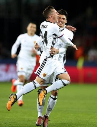 MOSCOW, RUSSIA - OCTOBER 18, 2017: Basel s Taulant Xhaka and Raoul Petretta (L-R front) celebrate scoring against CSKA Moscow in their 2017 18 UEFA Champions League Group A Round 3 football match at VEB Arena. Artyom Korotayev TASS  TS06551F