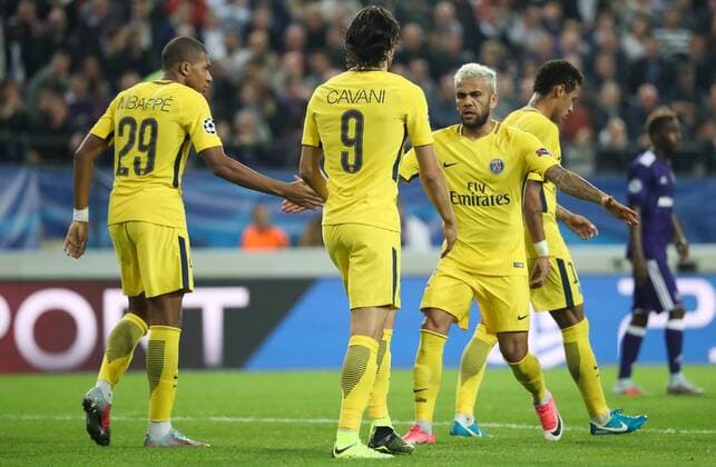 PSG s Kylian Mbappe, PSG s Edinson Cavani and PSG s Dani Alves celebrate after scoring during a third game (out of 6) in the group stage (Group B) of the UEFA Champions League competition between Belgian soccer team RSC Anderlecht and French club PSG Paris Saint-Germain, Wednesday 18 October 2017 in Brussels. VIRGINIExLEFOUR  x05185409x