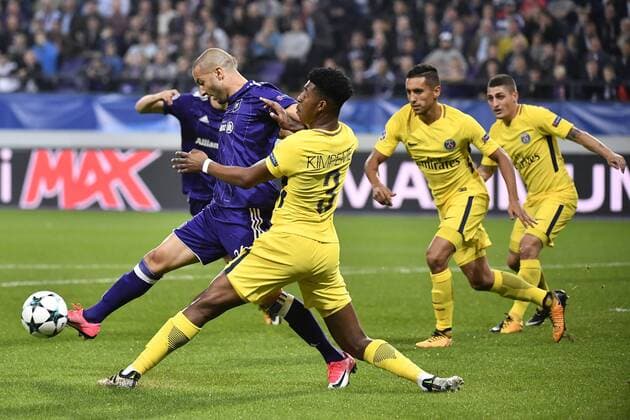 Anderlecht s Sofiane Hanni and PSG s Presnel Kimpembe fight for the ball during a third game (out of 6) in the group stage (Group B) of the UEFA Champions League competition between Belgian soccer team RSC Anderlecht and French club PSG Paris Saint-Germain, Wednesday 18 October 2017 in Brussels. DIRKxWAEM  x05185417x